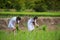 Two young Karen tribe lady grow rice in rice field