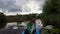 Two young men paddling canoe. Active rest, vacation, tourism