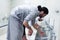 Two young Muslim people taking ablution for prayer. Islamic Religious Rite Ceremony Of Ablution. Two Young Muslims perform