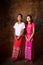 Two young Myanmar girls full body