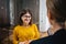 Two young positive businesswoman meeting in openspace office