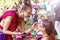 Two young pretty girls in Hindu national costumes in a summer Park