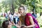 Two young pretty girls in Hindu national costumes in a summer Park