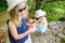 Two young sisters following a footpath around La Verna Sanctuary, Chiusi della Verna, in Casentino secular forest, one of the