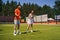 Two young tennis players enjoying their training session