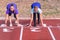 Two young woman preparing for a race