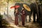 Two young woman with an umbrella with a elephant. Beautiful woman with the elephant in the jungle. Surin, Thailand