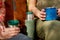 Two young women enjoying coffee outdoors