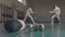 Two young women fencers having a training in the gym - gear on the foreground - swords and helmet