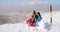 Two young women having fun in winter snow