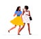 Two young women are walking together, laughing and talking. Communication, friendship and communication concept