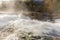 Tygart River cascades over rocks at Valley Falls S