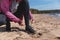 Tying shoelaces on sneakers. Girl prepares for sports running