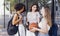 Tylish cool teen girls gathering at basketball court, friends ready for playing basketball outdoors