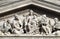 Tympanum bass relief showing the Virgin Mary and Hungarian saints, St. Stephen`s Basilica in Budapest