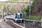 Type 2000 Commuter train at Shimo-Kosawa Station in Kudoyama, Wakayama, Japan. The station is a