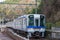 Type 2000 Commuter train at Shimo-Kosawa Station in Kudoyama, Wakayama, Japan. The station is a