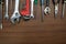 Types of adjustable wrenches and other tools on a wooden table