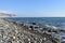 Types of the Black Sea. The outskirts of Anapa. Mountains and rocks, pebble beach.