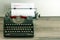 Typewriter with white paper page