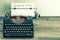 Typewriter with white paper page. AGENDA 2016