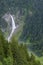 Typical alpine landscape with waterfalls , Swiss Alps near Klausenstrasse, Spiringen, Canton of Uri,