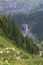 Typical alpine landscape with waterfalls, Swiss Alps near Klausenstrasse, Spiringen, Canton of Uri,