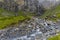 Typical alpine landscape with waterfalls, Swiss Alps near Klausenstrasse, Spiringen, Canton of Uri, Switzerland