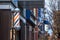 Typical American barbers pole seen in front of a barber shop of Montreal, Canada.