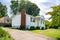 typical American one-story residential building with vinyl siding