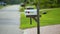 Typical american outdoors mail box on suburban street side