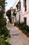 Typical Andalucia Spain old village narrow road whitewashed houses