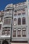 Typical Antique Portuguese Architecture: Grey Facade with Old Wi