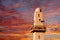 A typical Arabic mosque minaret with loud speaker on sunset