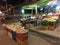 Typical Asian night market with delicious fruits