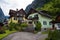 Typical Austrian Alpine houses with bright flowers, Hallstatt, Austria, Europe