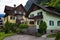 Typical Austrian Alpine houses with bright flowers, Hallstatt, Austria, Europe