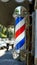 Typical barber`s pole, an ancient sign, which has distinguished this activity since the Middle Ages