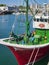 A typical basque Fishing boat moored  in the Muelle del Hospitalillo. Gipuzkoa, Spain