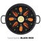 Typical black Spanish rice. Traditional paella made with rice an