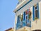 Typical blue balcony of a greek house.