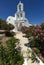 A typical blue domed church situated at Exo Gonia on the Greek island of Santorini