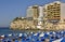 Typical blue sunbeds on the Benidorm beach with balcon del mar , Alicante - Spain