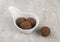 Typical brazilian brigadeiros in a bowl over wooden table