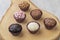 Typical brazilian brigadeiros, various flavors over wooden board