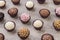 Typical brazilian brigadeiros, various flavors over wooden table