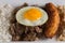 Typical Brazilian dish, diced meat, rice, fried egg and fried banana