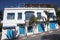 Typical building with white walls, blue doors and windows in Sidi Bou Said, Tunisia