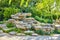 Typical Chinese garden, park with bizarre rocks. Beijing.