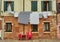 Typical city corner with ancient colorful buildings Drying clothes on a clothes-line in outdoor at sunny summer day. Venice